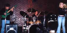 Lewis, Maria, and David Getche on drums at the jam